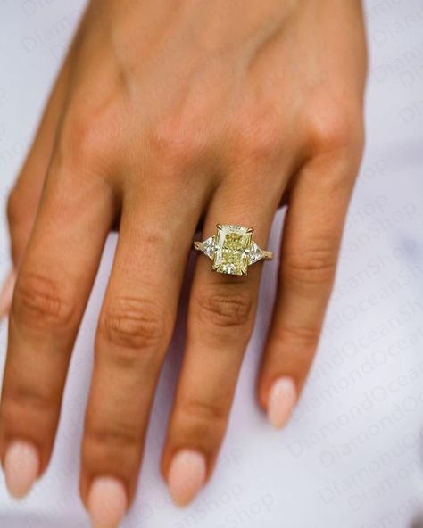 canary Yellow Moissanite Engagement Ring Yellow Radiant Cut Diamond Wedding Ring 14k yellow Gold ring Promise women fancy yellow diamondRing ♠ Stone Details ➵ Center Stone Weight: 5.0CT ( 11.25x8.25mm) Radiant Cut Moissanite ➵ Side stone: 1.20Ctw Moissanite ➵ Band width: 1.8mm ➵ Band thickness: 1.1mm ➵ Gemstone: Moissanite ➵ Stone Color (Fancy Yellow/Canary Yellow) ➵ Stone Luster: Excellent ➵ Stone Clarity: VVS1 ➵ Stone Make: High Quality ➵ Center Stone Shape: Radiant Cut ➵ Metal Change(10k/14k/ Canary Diamond Ring, Elongated Radiant, Radiant Cut Ring, Bridal Proposal, Fancy Yellow Diamond Ring, Radiant Cut Moissanite Engagement Ring, Radiant Cut Rings, Hidden Halo Ring, Yellow Diamonds Engagement