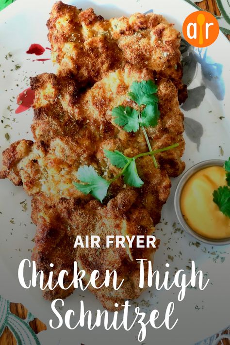 Air Fryer Chicken Thigh Schnitzel | "I find chicken thighs to be more flavorful than chicken breasts, and this schnitzel is a perfect example. Not only is it delicious, it is also cooked in the air fryer, making it lower in calories, oil free, and grease free." #allrecipes #airfryer #airfryerrecipes #howtouseanairfryer #dinnerideas Chicken Thigh Schnitzel, Air Fryer Schnitzel, German Cuisine Recipes, Ninja Grill, Schnitzel Recipe, Air Fryer Chicken Thighs, Schnitzel Recipes, Chicken Schnitzel, Chicken Thigh Recipes Oven