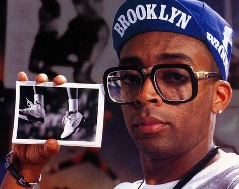 Must Watch: The Top 5 Spike Lee-Directed Movies #SpikeLee #Movies #Director #DotheRightThing #Crooklyn #Brooklyn #NYC #BlackExcellence Spike Lee Movies, Hip Hop Classics, Desain Editorial, Spike Lee, Cycling Cap, Hip Hop Culture, Vintage Eyewear, Film Director, Black Culture