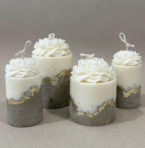 Introducing our exclusive Concrete candle. Each candle is fully handcrafted, ensuring that no two are ever alike, making yours a truly unique piece.       Our Concrete candle features a stunning combination of hard concrete and soft soy wax, blending with warmth and elegance of a candle. Adorned with gold accents and delicate flowers, tis candle is not just a source of light, but a statement piece for your home.         All-natural Soy wax and cotton wick.      Great gift for housewarming, birthday, Wedding, Thanksgiving Day, Christmas and any other holiday. Cement Candles, Concrete Vessels, Candle Aesthetics, Candle Decorating, Candles Modern, Diy Candle Art, Candle Making Studio, Concrete Candles, Candle Alternatives