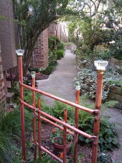 Copper Trellis Diy, Diy Garden Trellis Ideas, Copper Trellis, Yard Structures, Copper Projects, Trellis Gate, Glass Doorknobs, Copper Ideas, Garden Trellis Ideas