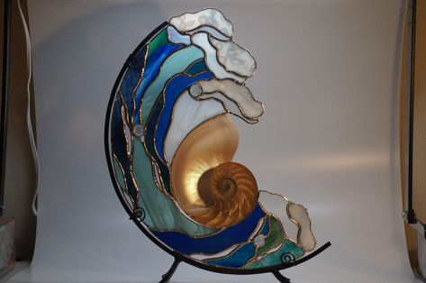 This is a beautiful stained glass with Nautilus shell. My son made the stand. Stained Glass Wave, Stained Glass Diy, Stained Glass Crafts, Stained Glass Panel, Art Stained, Glass Fish, Stained Glass Designs, Stained Glass Panels, Stained Glass Projects