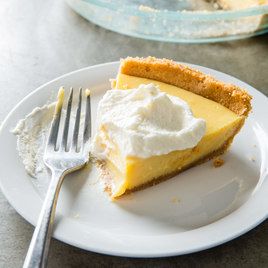 Sour Orange Pie by Cook's Country -- For a sour orange pie that would be accessible to cooks in any part of the country, we made a comparable substitute for the tart juice by combining lemon juice and orange juice concentrate. Sour Orange Pie Recipe, Sour Orange Pie, Orange Pie, Cooks Country Recipes, Sour Orange, Northern Florida, Cookie Toppings, Caramel Tart, America's Test Kitchen Recipes