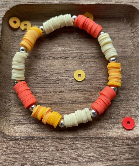 Clay Flat Beads Bracelet, Good Bracelet Ideas, Clay Bracelets Diy Summer, Preppy Bracelet Ideas Clay Beads Blue Pink Yellow, Preppy Summer Bracelets Clay Beads, Cute Clay Bead Bracelet Ideas Preppy Summer, Simple Clay Bead Bracelets, Summer Heishi Bracelets, Flat Bead Bracelet Ideas Summer