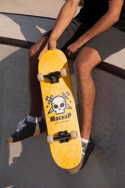 Young man holding a mock-up skateboard | Free Psd #Freepik #freepsd #skateboard-mockup #cool-guy #cool-man #guy Holding Skateboard, Flame Design, Free Psd, Mock Up, Mockup, Skateboard