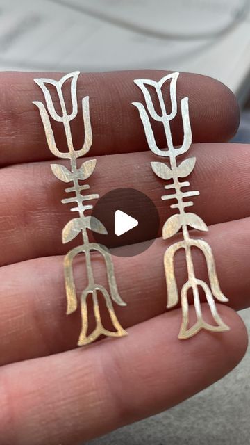 Shannon Bundschuh on Instagram: "Mach speed 💨 of the FIKA earring saw process for those who had inquiries. I thought this might be helpful. Lemme know if y’all have more questions! I didn’t get the actual sawing part 🤦🏻‍♀️ BUT… you get to see the rest of how I made duplicates without the extra work of sawing a design out TWICE. 

I’m having a wonderful time relaxing with my kids and hubs. Much deserved. It is good to step back for a moment and look forward to time in the studio. Feeling suuuuuuper grateful for this life! 💫

And who is ready for another season of White Lotus? 🪷 

meeeeeee 🙌🏼

#carryatorch #crushworthyjewelry #process #spedup #machspeed #jewelrydesigner #scandicollection #scandinavianinspired #tiptoethroughthetulips #tulips #sawing #fika #earrings #jewelryartist #meta Extra Work, White Lotus, Scandinavian Inspired, Step Back, Jewelry Tools, Artistic Jewelry, In The Studio, Wonderful Time, The Studio