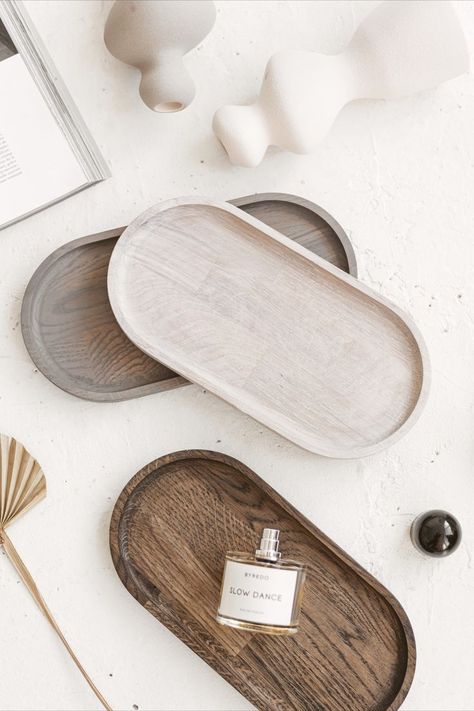 A beautiful piece of craftmanship. These wooden oak oval trays would be perfect for your living room or entryway and serve as a perfume, jewelry or candle display. The trays are cut out of natural oak wood and then covered with different colour oils, still showing the natural and beautiful texture of the wood. This would also be a perfect newlywed or housewarming gift. The trays also come in various sizes. We do also prepare custom and wholesale orders. Please contact us for that. Small Wooden Tray, Candle Display, Tray Coffee Table, Wooden Trays, Perfume Jewelry, Perfume Display, Coffee Tray, Minimal Photography, Light Jewelry