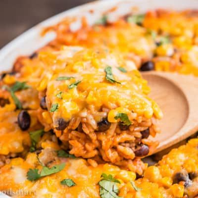 Cheesy Enchilada Rice and Beans Casserole - Mommy's Home Cooking Enchilada Rice, Cheesy Enchiladas, Black Beans And Rice, Bean Enchiladas, Meatless Monday Recipes, Rice And Beans, Meatless Dinner, Red Enchilada Sauce, Mexican Rice