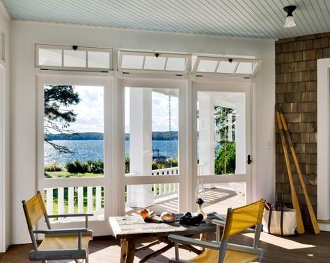 Operable hopper transom windows are great for creating cross-ventilation. Glass Porch, Traditional Porch, Three Season Porch, Three Season Room, Maine Cottage, House Of Turquoise, Transom Windows, Seaside Cottage, Exterior Remodel