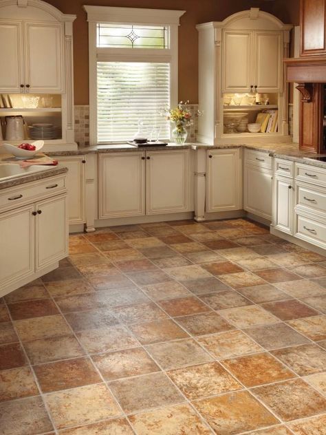 Vinyl Flooring in the Kitchen | HGTV Kitchen Flooring Ideas Vinyl, Types Of Kitchen Flooring, Vinyl Kitchen Floor, Kitchen Floor Tile Patterns, Lantai Vinil, Kitchen Floor Tile Design, Diy Kitchen Flooring, Modern Kitchen Flooring, Best Flooring For Kitchen