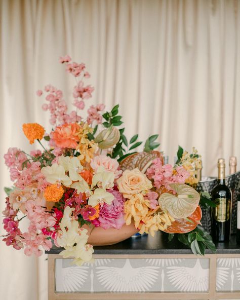 Poised 🌸 These bar arrangements added the perfect harmony of vibrant color, texture and overall visual interest to the cocktail hour. The color balances the draping, the black marble bar top, and the custom bar front. Photographer @joseph.rogero Planning and Design #jenniferbuonoevents Floral Design @bowsandarrowsflowers #jbe #jenniferbuono #cocktailhour #socialevents #custombar #cocktails #cocktail #eventplanning #eventplanner #destination #destinationeventplanner #destinationevents #an... Marble Bar Top, Marble Bar, Bar Fronts, Custom Bar, Color Balance, Bar Top, Perfect Harmony, Top Floral, Cocktail Hour