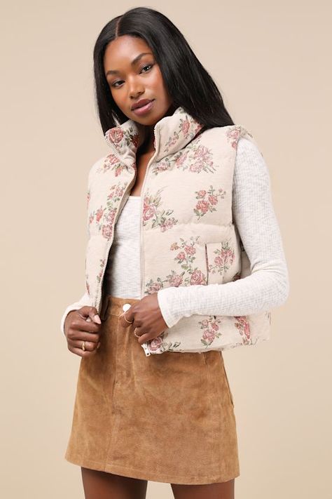 You'll stay cute in the chilliest weather as long as you've got the Jacquie the Label Darling Forecast Beige Jacquard Floral Puffer Vest! Soft quilted fabric, with a vintage-inspired floral jacquard design, shapes this essential vest that has a mock neckline and a sleeveless bodice with a front zipper. Twin welt pockets offer a cozy spot for your hands, and a cropped hem completes the look. Fit: This garment fits true to size. Bust: Great for any cup size. Waist: Loosely Fitted. Fabric: Fabric h Essential Vest, Design Shapes, Floral Vests, Cute Modest Outfits, Cozy Spot, Jacquard Design, Puffy Vest, Style Inspiration Winter, Quilted Fabric