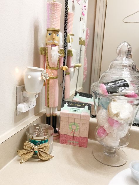 Christmas bathroom decor pink nutcracker lush bubble bath too faced grande hotel cafe and twisted peppermint candle oh how I love a pink Christmas 🎄🎀 Pink Christmas Bathroom Decor, Pink Christmas Bathroom, Spa Christmas Decor, Pink Christmas Bedroom, Pink Powder Room, Bathroom Decor Pink, Peppermint Candle, Sugarplum Fairy, Peppermint Candles