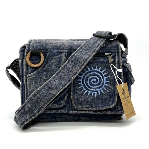 Puzzlestack’s Lukla Blue Stone-Washed Embroidered Messenger Bag Is A Compact Yet Voluminous Bag. Along With Its Multiple Pockets Used For Storage, It Includes A Large Flap Closure With Velcro. Starting Off With The Two Front Pockets, Open Up The Flap To Find The Main Compartment Following The Large Extra Pocket, And Even A Cute Mini Side Pocket! Make Travel Hands-Free With This Spacious Bag. Express Yourself With 5 Different Hand-Embroidered Thread Designs To Choose From! Not Only Is This Bag Su Sustainable Bag, Bag Pins, Brown Crossbody, Canvas Crossbody Bag, Black Leather Crossbody Bag, Crossbody Messenger Bag, Denim Bag, Black Crossbody, Mini Purse