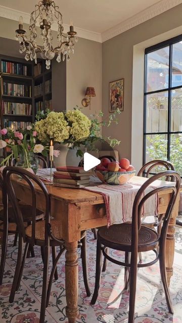 Elle Hervin on Instagram: "My favourite transformation... from room of doom to dream little home library 📚. And yes, we did block up a window! But just look at the space we started with... it was grim! 😱

When we first bought the house, this space was a neglected, outdated kitchen. It's gradually evolved over the last few years into my favourite space; a cosy, comforting library that doubles as a dining room. Because sitting at this old table, surrounded by books, is pretty special ✨️.

For those wondering why we blocked up a window, it wasn't original stained glass but an old upvc window that looked out on to a fence! Not the best view 😂. We now have seamless rows of books and the space works so much better for us.
.
.
.
.
.
#homelibrary #vintageinteriors #readingnook #diybookshelf #vi Diy Home Library, Surrounded By Books, Dream Home Library, English Country Cottage, Dark Kitchen, Vintage Bedroom, Romantic Decor, English House, Whimsical Decor