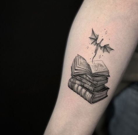 Fantasy Reading Tattoo, Tattoo Idea For Book Lovers, Book Tattoos With Dragons, Bookish Tattoos Dragon, Tattoos For Fantasy Book Lovers, Book With Dragon Tattoo, Realism Book Tattoo, Bookish Dragon Tattoo, Dragon And Book Tattoo Ideas