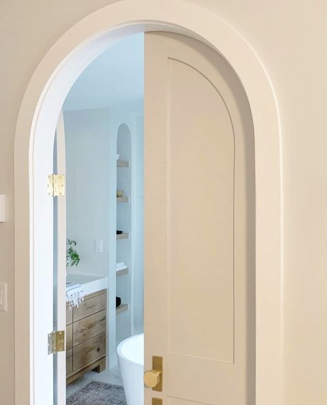 A peek inside the arched doorway to a masterbath with custom vanities and marble floors. Arched Interior Doors, Arched French Doors, Arch Doorway, Arch Interior, Arched Doors, غرفة ملابس, Bathroom Doors, Arched Windows, Bedroom Doors