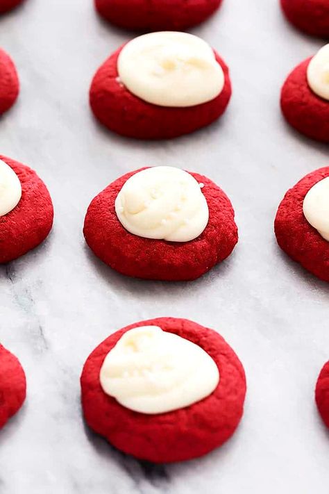 These thumbprint cookies are buttery pillows of dreamy cookie goodness filled with rich cream cheese frosting and I have eaten WAY too many of them.