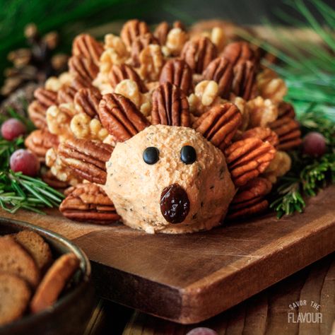 Woodland Hedgehog Cheese Ball: a simple, savory appetizer that will be a stunning centerpiece at a woodland baby shower or first birthday.  Cream cheese, cheddar, Worcestershire sauce, and spices make this vegetarian snack idea a super cute, gender neutral munchie. | www.savortheflavour.com #woodland #babyshower #firstbirthday #hedgehog #cheeseball Hedgehog Cheese Ball, Woodland Hedgehog, Potato Slices, Maple Bourbon, Jiffy Cornbread, Glazed Ham, Cornbread Dressing, Cheese Ball Recipes, Ocean Spray