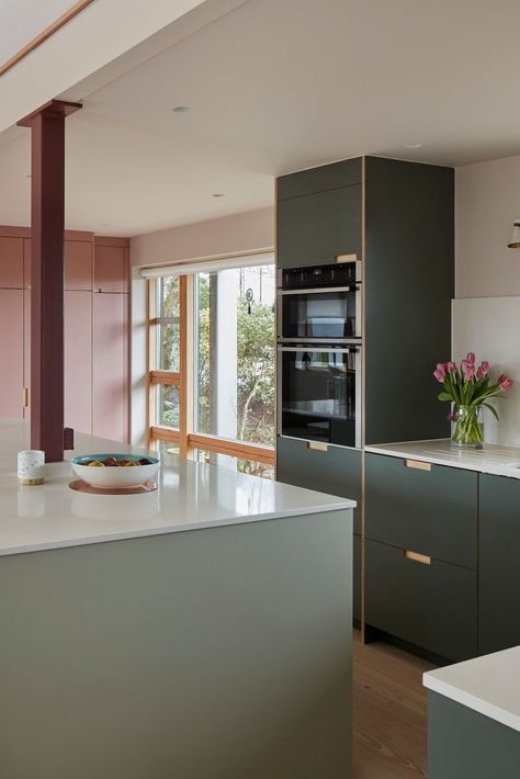 Plykea Formica Green Slate, Bush & Seed birch plywood kitchen fronts paired with semi-recessed handles, to customise an IKEA kitchen 🖤. All using IKEA Metod or Sektion cabinets.  #plywoodkitchen #birchplywood #plywood #ikeahack #kitchenideas #kitchentrends  📷 Chris Snook Photograph⁠y Formica Kitchen Cabinets, Formica Kitchen, Plykea Kitchen, Green Flat Panel Kitchen Cabinets, Sage Green Kitchen Plywood, Kitchen Plywood Color, Marine Plywood Kitchen, Formica Cabinets, Pink Backsplash Kitchen Terrazzo