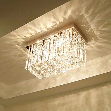 Light reflection of the crystals makes the space to be romantic. Jhoomer For Living Room, Chandler Lights, Metal Living Room, Cheap Ceiling Lights, Rectangular Chandelier, Flush Mount Chandelier, Crystal Chandelier Lighting, Modern Crystal Chandelier, Diy Ceiling