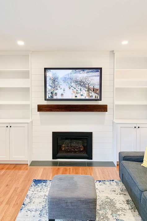 Sneak peak: A new gas fireplace insert, shiplap, mantle and custom built-ins create a stunning focal point in this cozy family room. Fireplace Built Ins Uneven, Built Out Shelves Living Room Fireplace, Built In Shelves Living Room Gas Fireplace, Built In With Fireplace Insert, Gas Fireplace Tv Wall Built Ins, Gas Fireplace Built Ins With Tv, Built In Gas Fireplace And Tv, Gas Fireplace With Built Ins On Both Sides, Adding A Gas Fireplace To Living Room