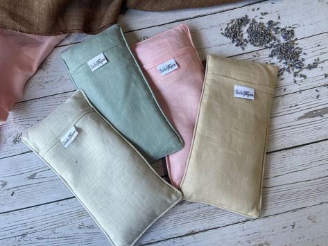 "The SacksyThyme Organic Linen Eye Pillow makes the perfect gift for yoga lovers or anyone who enjoys indulging in self care wellness routines. Enjoy a spa like experience at home with our organic linen eye pillow. Use it during a yoga session, or just relaxing at the end of a busy day! Great for stress relief, meditation, migraine, sinus pressure, congestion, eye strain and more. Made with soft washed organic linen, the Sacksy Thyme Linen Eye Pillow gently engages pressure points to alleviate facial tension around the delicate eye area. Filled with organic flaxseed, with an option to add french lavender or eucalyptus to help lift your mood, our linen eye pillow helps alleviate sinus pressure, enhance your meditation, savasana, help soothe headaches or even help relax after a busy day. Mak Sinus Migraine, Diy Weighted Eye Pillow, Yoga Eye Pillow Diy, Eye Heating Pad, Aromatherapy Eye Pillow Diy, Yoga Eye Pillow, Aromatherapy Eye Pillow, Sinus Relief, Sinus Pressure