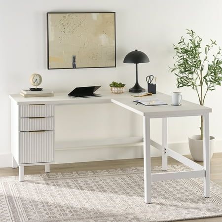 This L-shape computer desk will add a contemporary feel to your room. L-shape can be well adapted to the corner environment to save enough space. This office desk offers a spacious, L-shaped work area that provides you and your kids with all the room you need for items like your laptop, stacks of folders, notepads, and of course your hot cup of coffee. The Desk creates an efficient workspace environment. It has a MDF wood tabletop. It offers a spacious space meeting your work needs while you foc L Shaped Desk White, L Shaped Desk Ikea, Office With White Desk, Home Office Corner Desk Ideas, L Shaped Desk Setup, Ikea L Shaped Desk, Corner Desk Ideas, White L Shaped Desk, Simple Office Desk