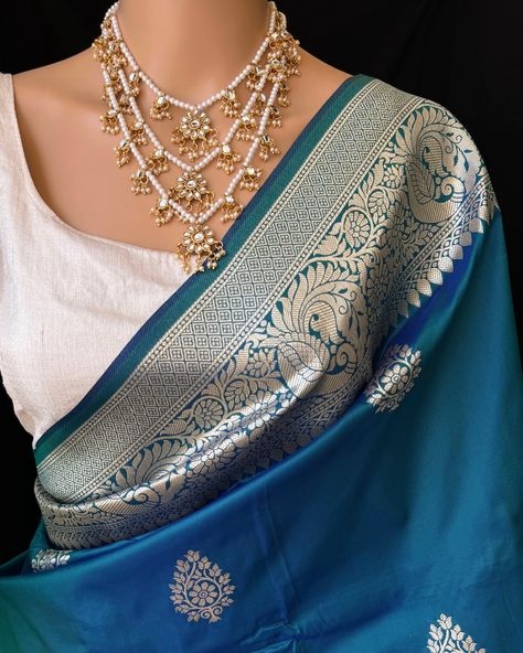 Peacock blue Art silk saree with contrast golden zari border and design all over saree. Comes with running blouse. Find this saree in our website: Www.thejacouture.in > silk sarees> peacock blue art silk saree. #silksarees #peacockbluesaree #artsilk #sareeslove #silk Blouse For Blue Saree, Peacock Blue Saree Contrast Blouse, Blue Saree Contrast Blouse, Peacock Blue Saree, Saree Contrast Blouse, Blouse Designs Indian, Blue Saree, Art Silk Sarees, Saree Trends