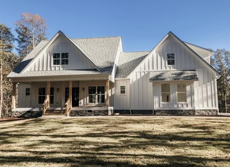 White House With Grey Metal Roof, White House Grey Roof, White Barndominium Exterior, Tin Roof House, Vertical Vinyl Siding, Rustic Farmhouse Exterior, River House Decor, Metal Roof Houses, White Siding