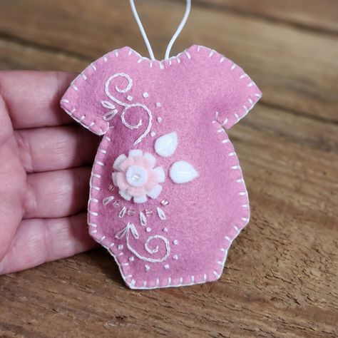 Felt Onesie Ornament Baby's First Christmas 2023 Felt Onesie Ornament, Baby First Christmas Ideas Crafts, Felt Baby Ornament, Pink Felt Ornaments, Baby Felt Ornament, Baby Ornaments Diy, Diy Baby’s First Christmas Ornament, Onesie Ornament, Embroidery Christmas Ornaments