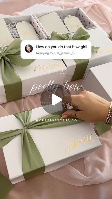 CASSANDRA • Bridal Gifts | Laser + Engraved Keepsakes on Instagram: "Here’s a real-time video on how I tie my bows 🎀🫶🏼
•
•
•
•
•
•
#ribbontutorial #tutorial #ribbontyingtutorial #bridesmaidproposal #willyoubemybridesmaid #maidofhonour #torontobrides #wedluxe #luxuryproposals #practicalgifts #customgifts #smallbusiness #torontosmallbusiness #weddinginspo #torontoweddings #bridalgifts #weddinggifts #bridesmaidgifts" Box Bows Ribbons, How To Tie A Gift Box Ribbon, Box Ribbon Wrap Bow Tutorial, Ribbon Tutorial Gift, Proposal Box Ideas Bridesmaid Gifts, How To Ribbon A Box Gift, Ribbon Tying Tutorial Gift Wrapping, Gift Bows Diy Ribbon, Giftset Idea