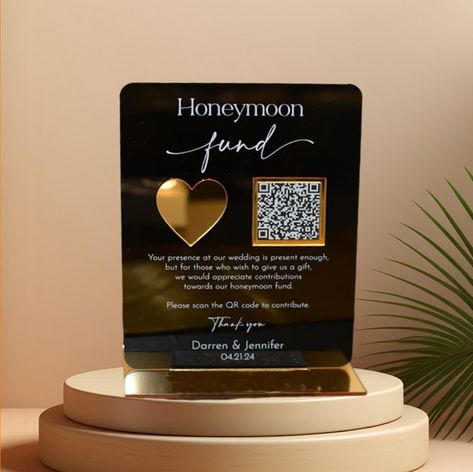 PRICES MAY VARY. Personalized Design: This modern and minimalist wedding acrylic sign features a golden mirror effect and a custom scannable QR code. You can customize the text with the names of the bride and groom, as well as the wedding date and any other details you wish to include. The sign is perfect for displaying at the wedding reception, on the honeymoon, or in the couple's new home. High-Quality Materials: The sign is made from high-quality acrylic material, which is durable, lightweigh Acrylic Table Signs, Honeymoon Fund Sign, Mirror Wedding Signs, Bridal Era, Wedding Qr Code, Yellow Wedding Theme, Taylor Wedding, Wedding Acrylic, Qr Code Wedding