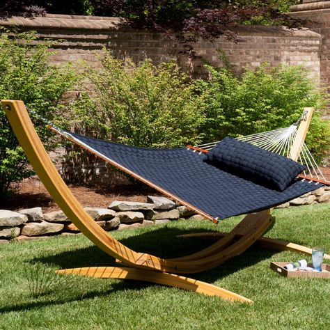 Hammocks: create your own customized backyard retreat.  Hammocks Are Perfect For Lazy Summer Fun!  Today hammocks in a variety of styles and colors are used for relaxing and unwinding in all kinds of settings. From enjoying a snooze by the poolside to resting in the shade of the trees in your own backyard on a hot sunny day to being a handy camping accessory there are a number of ways to enjoy the comfort of a hammock!  There are several different sorts of hammocks available these days each ... Backyard Hammock, Relaxing Backyard, Hammock Stands, Outdoor Hammock, Hammock Stand, Backyard Retreat, Hammock Camping, Outdoor Rooms, Outdoor Life