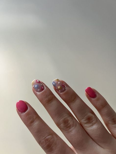 a hand with simple nail art, 2 of the fingers are bright pink and the other ones are floral designs, with blue, yellow and pink flowers that have white accents. Easy Nail Art Summer, Mismatched Nails, Trending Nail Designs, Nail 2022, Acrylic Nail Drill, Squiggly Lines, Trends Nails, Nail Art Diy Easy, Long Square Nails