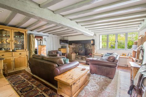 This idyllic 16th century fairy tale thatched cottage in Devon is up for sale Cottages Interiors, British Home Decor, Painted Beams, Beams Living Room, Newton Abbot, Old Village, Sitting Rooms, Cottage Renovation, Cottage Furniture