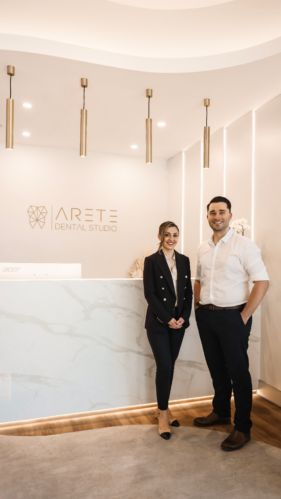 Arete Dental - Consilo Aesthetic Clinic Interior, Dental Reception, Warm Paint Colors, Clinic Interior, Walnut Timber, Timber Slats, Dental Office Design, Dental Cosmetics, Aesthetic Clinic