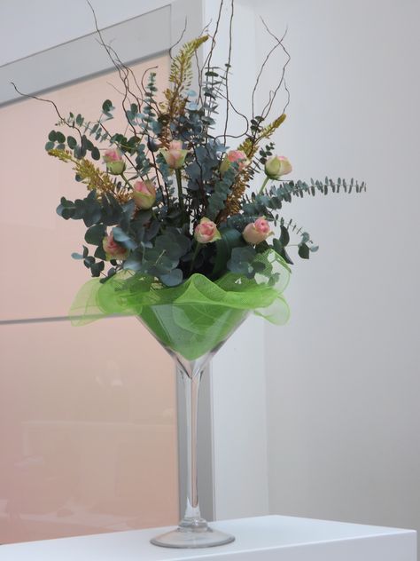 Arrange Flowers Made of Glass | Martini glass arrangements Wine Glass Arrangements, Flower Arrangements In Wine Glasses, Wine Glass Flower Arrangement, Foxtail Lily, 70s Birthday, Arrange Flowers, Large Wine Glass, Flower Arrangement Designs, Glass Decoration