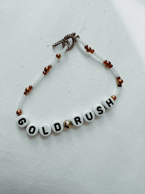 Gold rush beaded friendship bracelet Gold Rush Taylor Swift Bracelet, All To Well Bracelet, Gold Rush Bracelet, Friendship Bracelets Taylor Swift Ideas, Tswift Bracelets, Evermore Friendship Bracelet, Evermore Bracelet, Eras Friendship Bracelet, Friendship Bracelets Taylor Swift