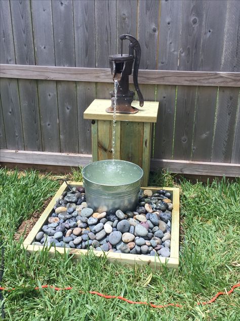 Water well hand pump, fountain basin, beach rocks and a milk bucket. 3rd fountain in my small back yard. Zen Water Fountain, Diy Water Pump, Hand Pump Well, Garden Water Pump, Old Water Pumps, Pump Fountain, Hand Water Pump, Water Fountain Pumps, Diy Water Fountain