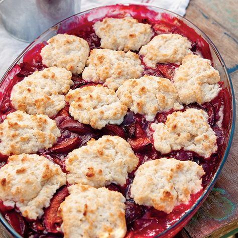 This juicy plum cobbler is topped with rich cream cheese biscuits. Plum Cobbler, Cream Cheese Biscuits, Fresh Fruit Desserts, Plum Recipes, Apple Brandy, Fruit Cobbler, Cheese Biscuits, Cobbler Recipes, Paula Deen