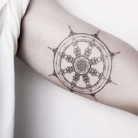 Dharma Wheel Tattoo Design, Dharma Wheel Tattoo, Tattoo Buddhist, Buddhism Tattoo, Wheel Of Dharma, Tibetan Tattoo, Alchemy Tattoo, Wheel Tattoo, Karma Tattoo