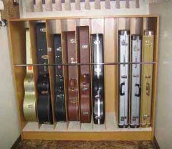 How To Store Guitars, Guitar Closet Storage, Instrument Organization, Guitar Cable Storage, Guitar Closet, Guitar Case Storage Diy, Guitar Storage Cabinet, Tradition House, Music Room Storage