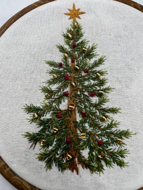 "EMBROIDERY PATTERN FOR BEGINNERS, The Christmas Tree 6\" hoop design pattern This holiday embroidery pattern features a realistic Christmas tree with little ornaments and beaded accents. Full pattern kit includes, traceable pattern, color chart. full instructions, links to stitch video tutorials and stitch diagrams.   All of my designs are original and are not imports. * Please note the designer hoop frame is for display only but is  available in my shop. ♥Thanks for visiting!   ©2017-2021 VLH Holiday Decor Crafts, Christmas Tree Embroidery Patterns, Pine Tree Embroidery, Holiday Embroidery Patterns, Wall Decor Embroidery, Embroidered Christmas Tree, Christmas Tree Embroidery Design, Beaded Christmas Tree, Bordados Tambour