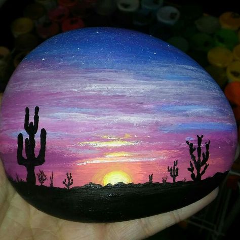 Sunset in the desert rock. Sunset Painting On Rock, Stone Painting Sunset, Rock Art Sunset, Cool Rock Painting Ideas Sunset, Silhouette Rock Painting, Large Rock Painting Ideas, Sunset Rock Painting, Stone Art Painting, Painted Rocks Craft