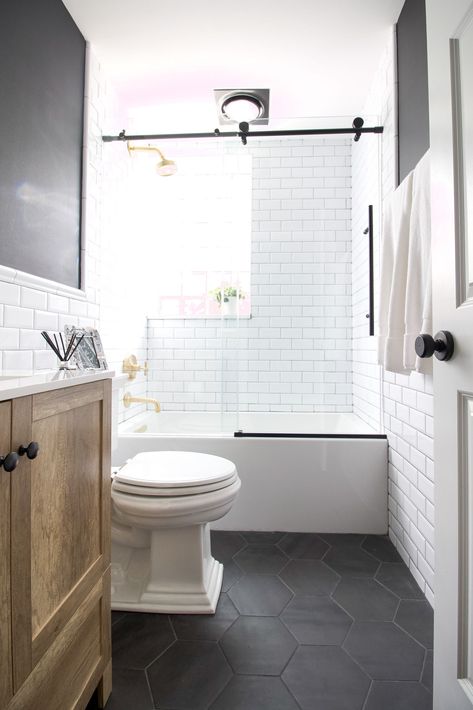 Bathroom Remodel Black Tile Floor, Small Bathroom With Hardwood Floors, Black Cabinet Small Bathroom, Small Second Bathroom Ideas, Tiny Bathroom Cabinet Ideas, Small Bathroom Remodel With Bathtub, Black And White Floors Bathroom, 1960 Bathroom Update, Black And White Bathroom With Wood