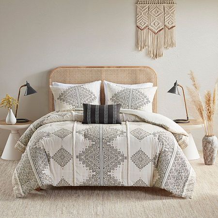 This soft microfiber artisan comforter set features a printed global inspired design of small triangular shapes and lines that when formed together depicts larger geometric shapes and stripes with two chenille trims.Set includes comforter, 2 matching shams, 1 square throw pillow.Printed microfiber; 100% polyester filling.Global inspired design featuring black/brown triangular shapes and lines on top of a beige and ivory background.Two vertical puffy chenille trim accent the top of bed for nice details.Machine washable and spot clean fabric (see care label).Items may come in compressed packaging to ensure efficient shipping.Items will need to be fluffed up and steam ironed if compressed.Hypoallergenic polyester filling in the comforter and pillow (filling contains no allergens and is treate Chic Boho Bedroom, Linen Comforter, Western Bedding, How To Clean Pillows, Top Of Bed, Home Decor Colors, Ivory Background, Print Comforter, Madison Park