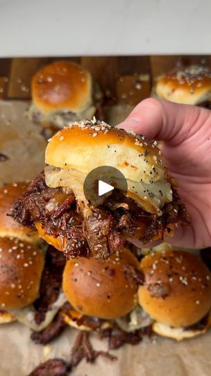 119K views · 3.3K reactions | BBQ Beef Sliders #bbq #sandwich #food | BBQ Beef Sliders #bbq #sandwich #food | By Burnt_Pellet_BBQ | These barbecue beef sliders are one of the best things you can make for game day. Take a well-marbled chuck roast. Cut it up into pieces. Use yellow mustard as a binder and season it with your favorite barbecue rub. Get them on the Kamado Joe at 250 for three hours using cherry wood. Wrap them up in foil with butter, beef broth, and barbecue sauce. Let them cook for another few hours till they're fall apart tender. Dice up an onion then cook them till they're caramelized. Then we're going to assemble the sliders with cheddar cheese, the smoked beef, onions, barbecue sauce, provolone cheese, brush some melted butter on top, add everything bagel seasoning, then Bbq Beef Sliders, Bbq Sliders, Smoked Bbq, Everything Bagel Seasoning, Beef Sliders, Bagel Seasoning, Roast Beef Recipes, Slider Buns, Backyard Grilling