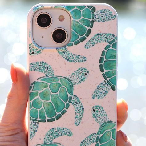 The Turtle Bay design beautifully captures the calming blue and green tones of boho painted turtles swimming peacefully in the ocean. The eco-friendly and compostable mobile phone case is made from 100% biodegradable, sustainable and high-tensile materials which protect your phone, and our planet earth. Case features; Raised bezel helps to protect the screen and camera lens. 1.2mm thickness. Flexible texture, smooth matted design. Enclosed side buttons. Port openings allow easy access for cables Painted Turtles, Turtles Swimming, Turtle Phone Case, Preppy Phone Case, Summer Phone Cases, Turtle Bay, Our Planet Earth, Pretty Iphone Cases, Turtle Painting