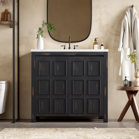 This charming vanity features a classic vintage design that adds a touch of timeless elegance to any bathroom decor. The vanity includes a durable ceramic sink, offering a sleek and easy-to-clean surface that complements the vintage aesthetic. The compact design ensures it fits perfectly in smaller bathrooms or powder rooms without compromising on style. Below the sink, the open shelf provides practical storage for towels, baskets, or decorative items, adding both functionality and character to Half Bathroom Black Vanity, Refurbished Bathroom Cabinets, Modern Organic Powder Room, Black Cabinet Bathroom Ideas, 36” Bathroom Vanity, Bathroom Sink With Cabinet, Tile Bathroom Vanity, Bathroom Vanity Mid Century, Cool Bathroom Vanity